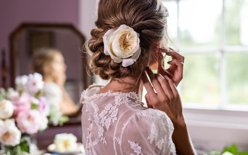 Wedding Morning Hair Styling with White Rose Design
